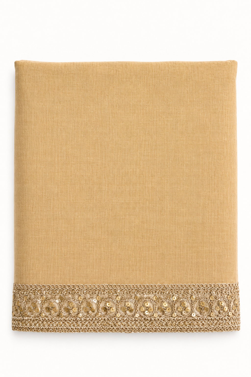 A folded beige fabric item, likely a napkin or table linen, featuring a decorative gold embroidered border along the bottom edge, shown against a plain white background.